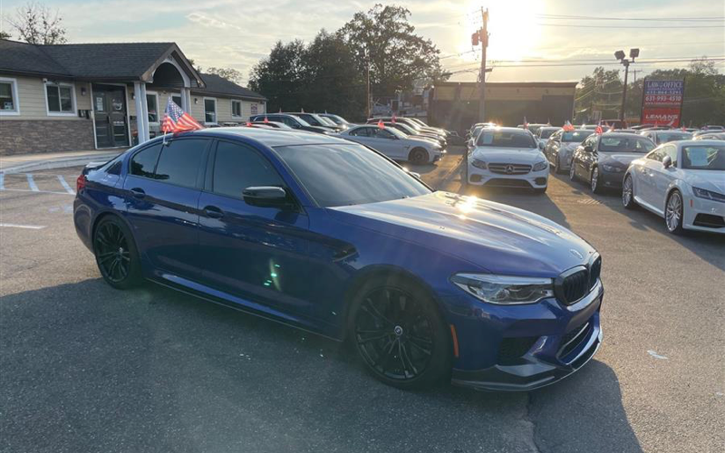 Before: Basic car dealership lot photo